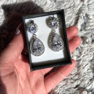 Halo pear shaped earrings